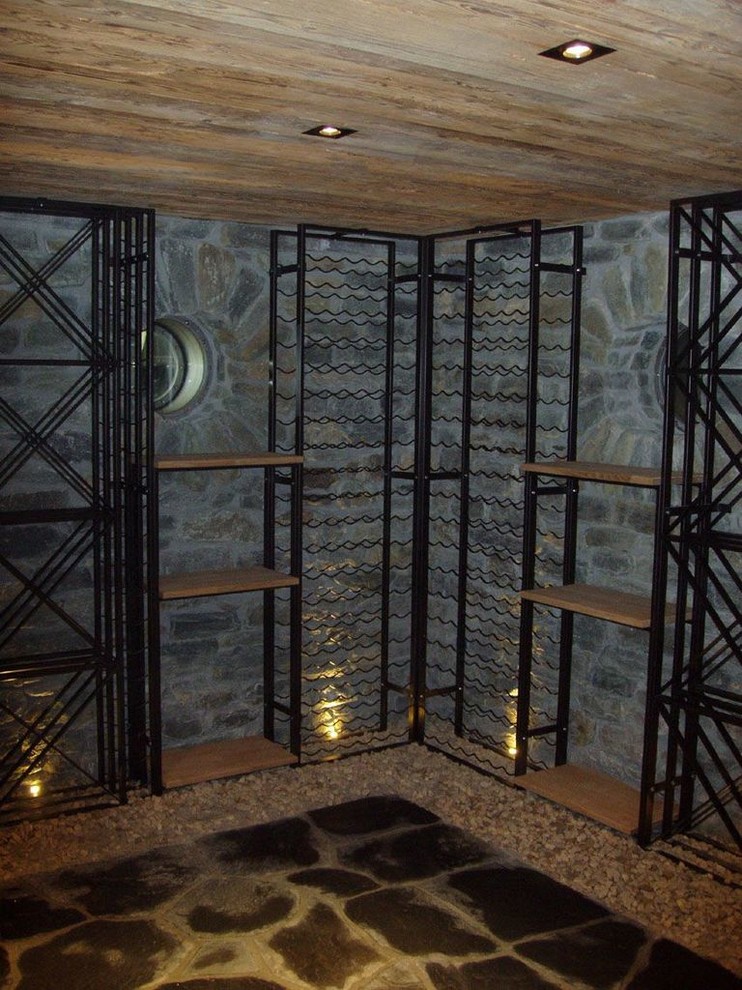 Inspiration for a contemporary wine cellar remodel in Surrey