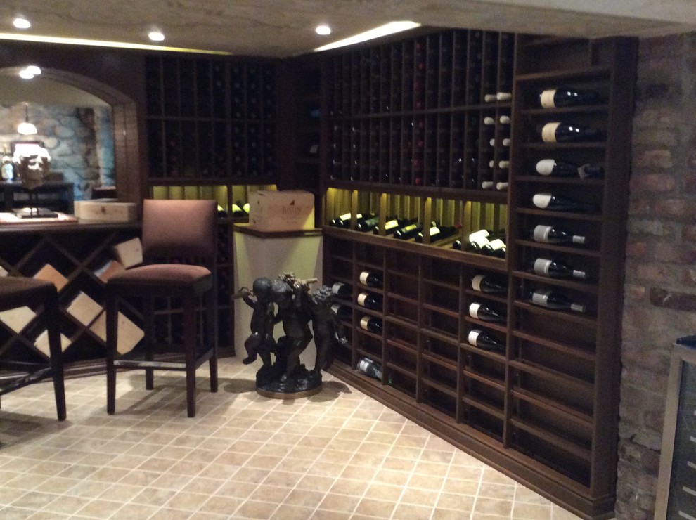Inspiration for a large romantic wine cellar in Los Angeles with display racks.