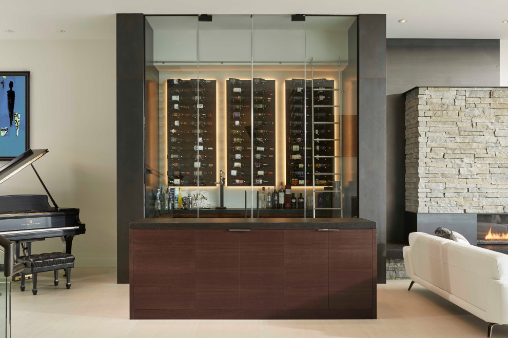 This is an example of a medium sized modern wine cellar in Seattle with porcelain flooring, display racks and white floors.