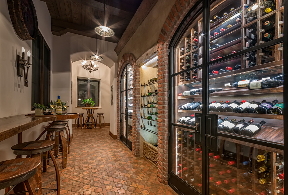 Wine cellar - mid-sized rustic wine cellar idea in San Diego