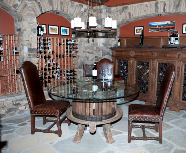 Mid-sized elegant slate floor wine cellar photo in Atlanta with storage racks