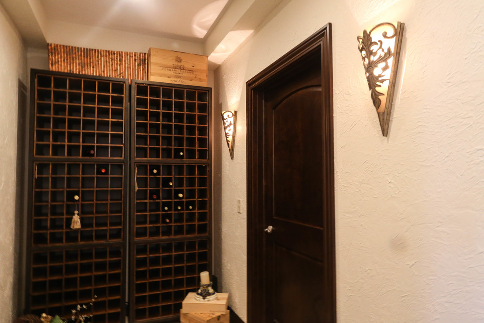 Design ideas for a medium sized classic wine cellar in Other with porcelain flooring, storage racks and beige floors.