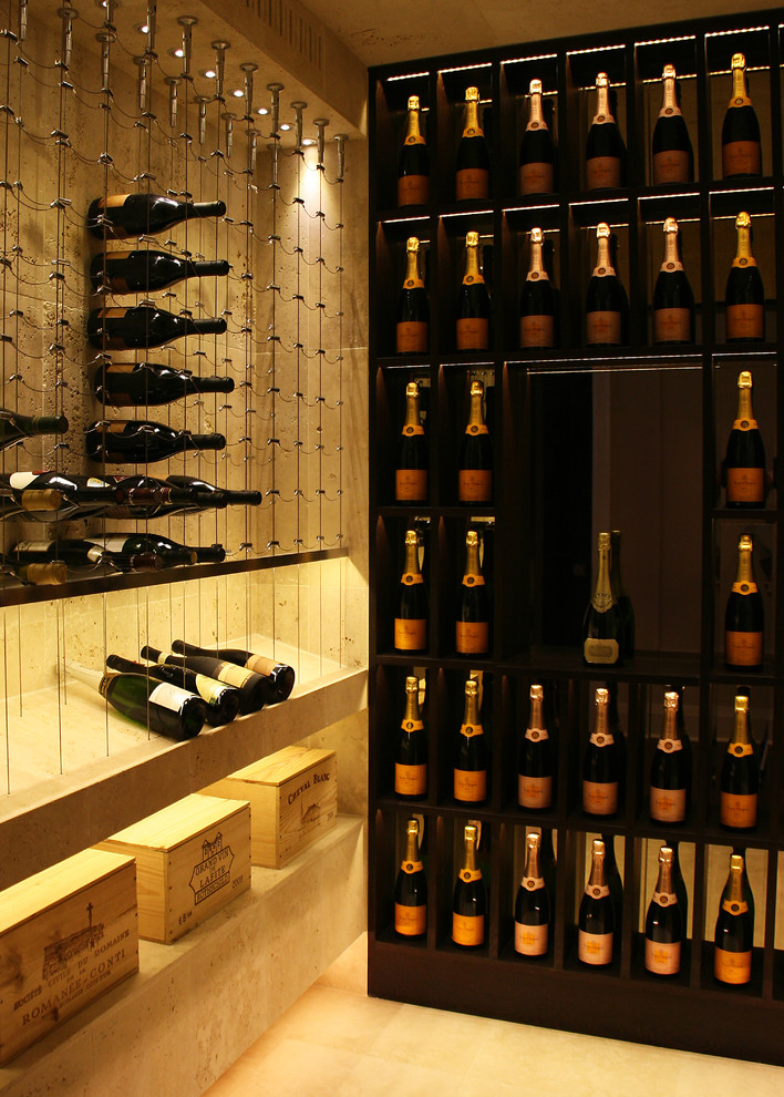 Contemporary wine cellar in Toronto with display racks.