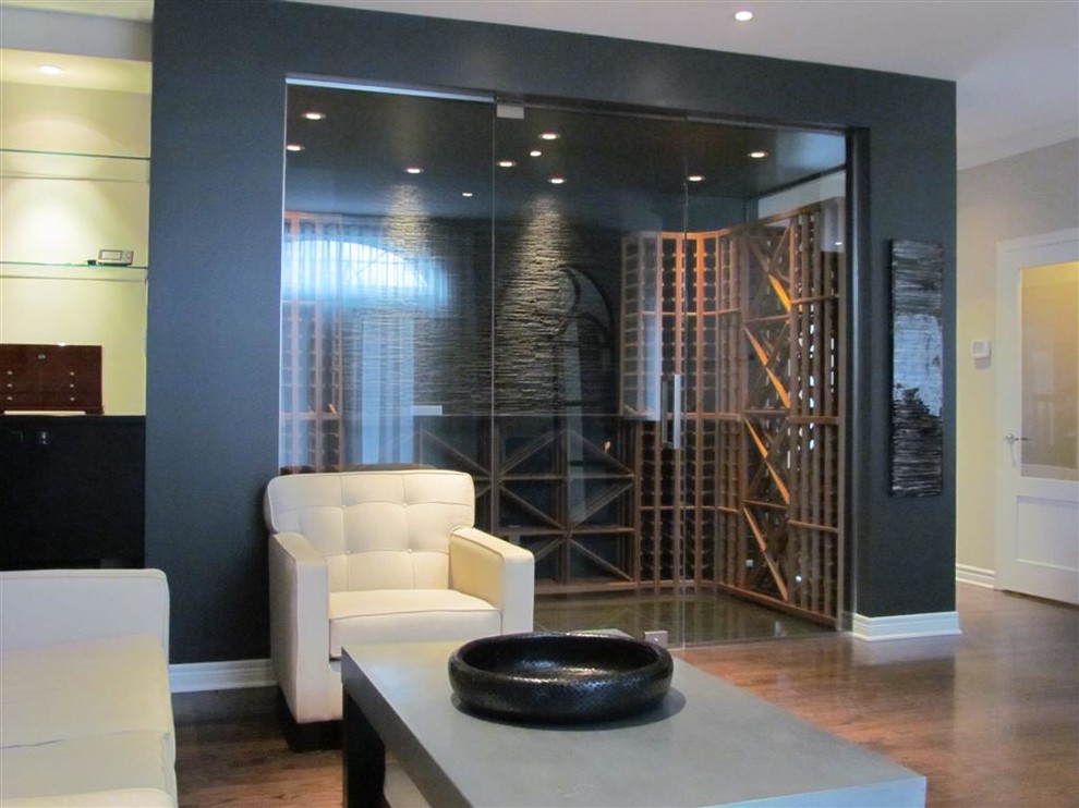 Example of a minimalist wine cellar design in Montreal