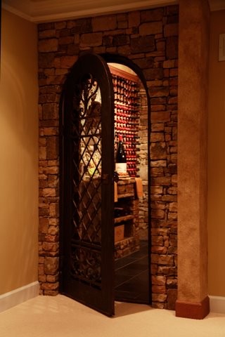 Wine cellar - mediterranean wine cellar idea in Atlanta