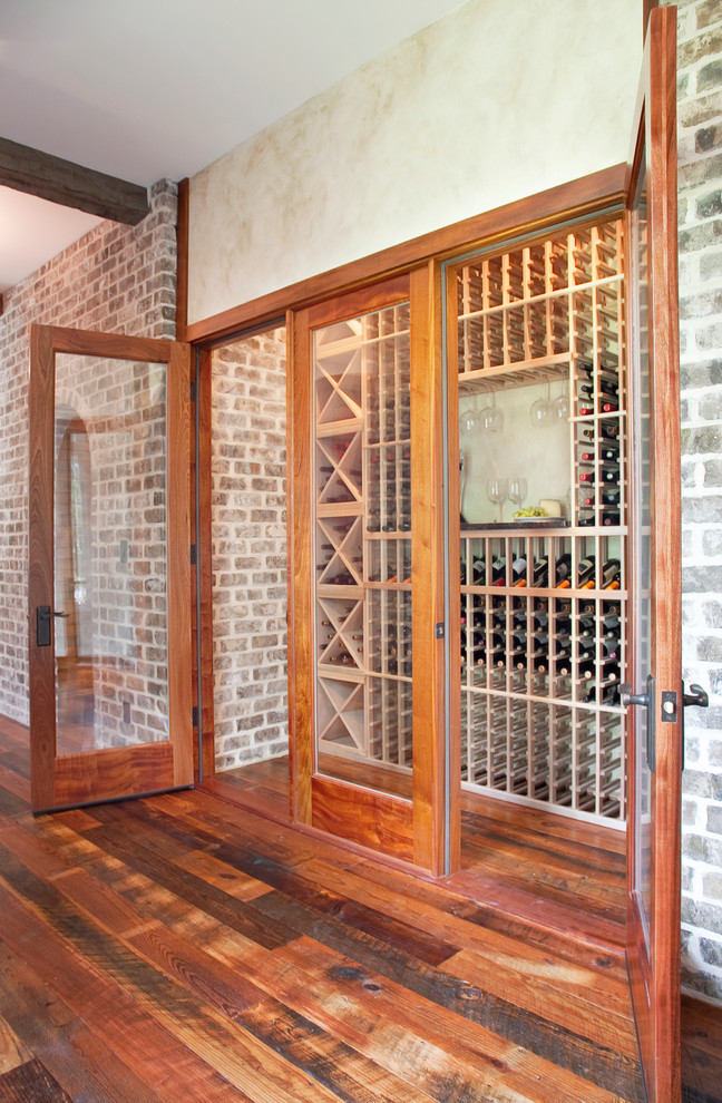 Wine cellar - traditional wine cellar idea in Charleston