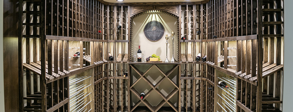 Design ideas for a medium sized traditional wine cellar in Chicago with storage racks.
