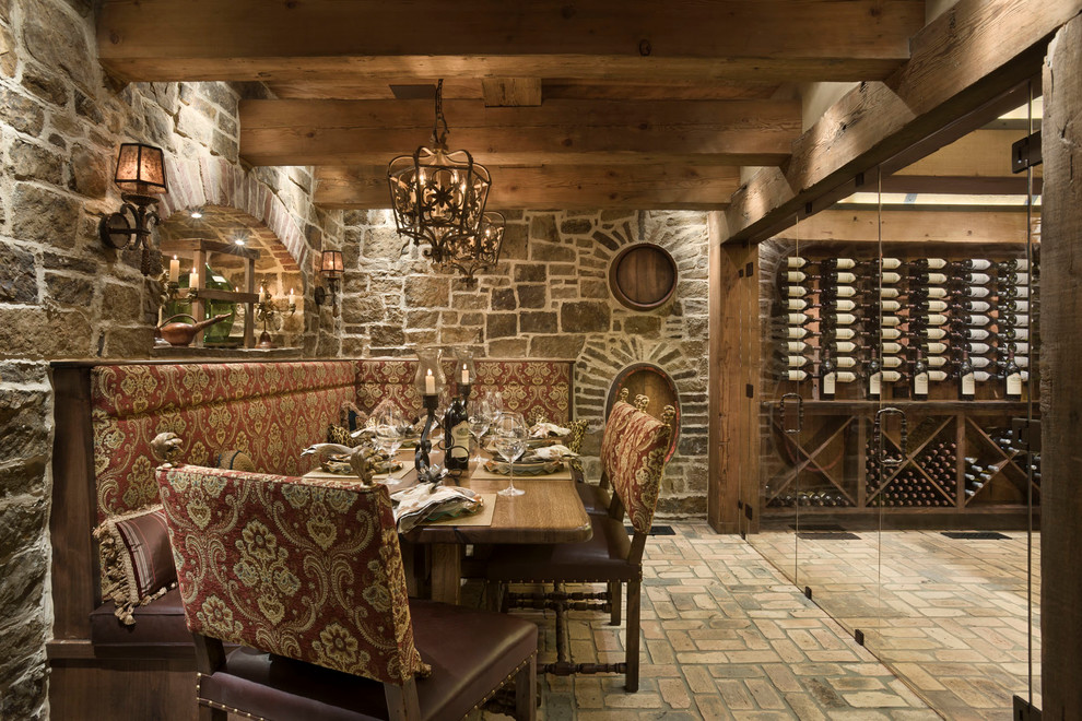 This is an example of a rustic wine cellar in Other with brick flooring.