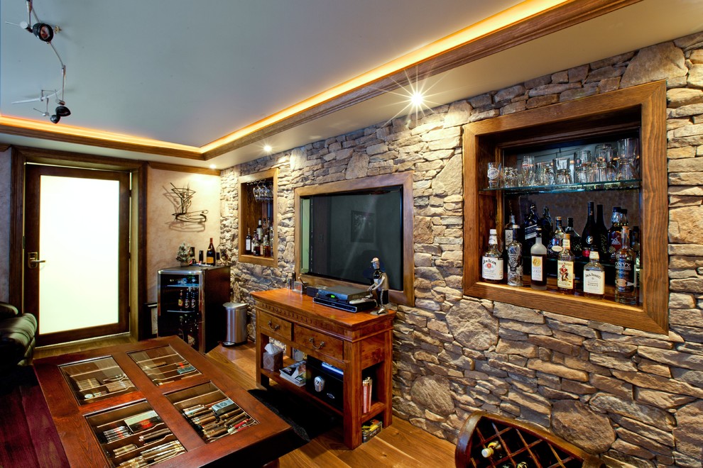 Medium sized classic wine cellar in New York with medium hardwood flooring, display racks and brown floors.