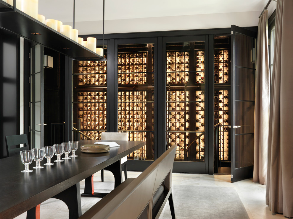 This is an example of a contemporary wine cellar in St Louis with storage racks.
