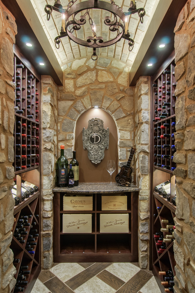 Example of a tuscan wine cellar design in Nashville