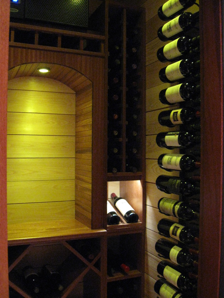 Example of a trendy wine cellar design in Atlanta with display racks