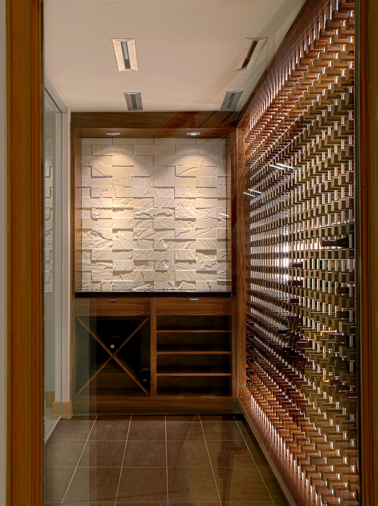 Photo of a contemporary wine cellar in Milwaukee.