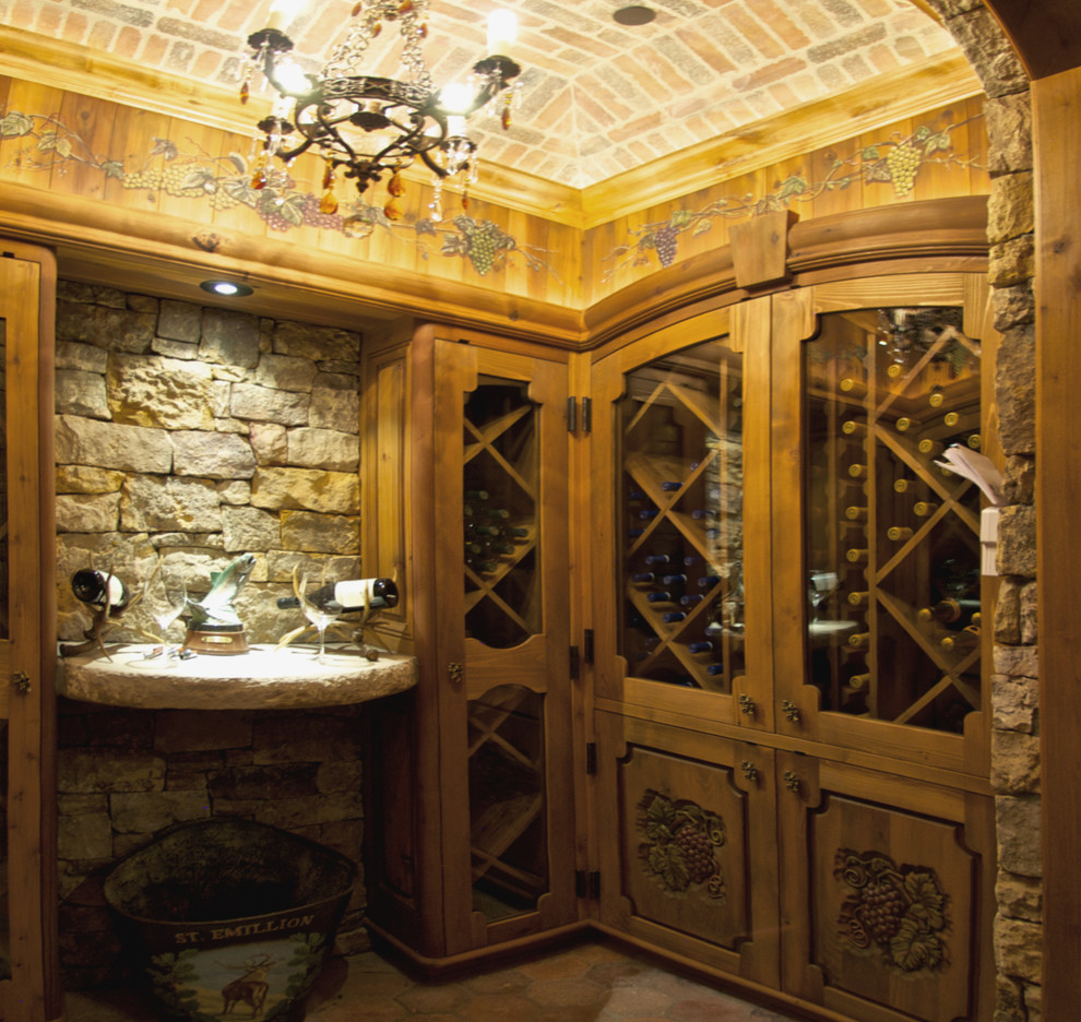 Idéer för mellanstora rustika vinkällare, med klinkergolv i terrakotta och vinställ med diagonal vinförvaring
