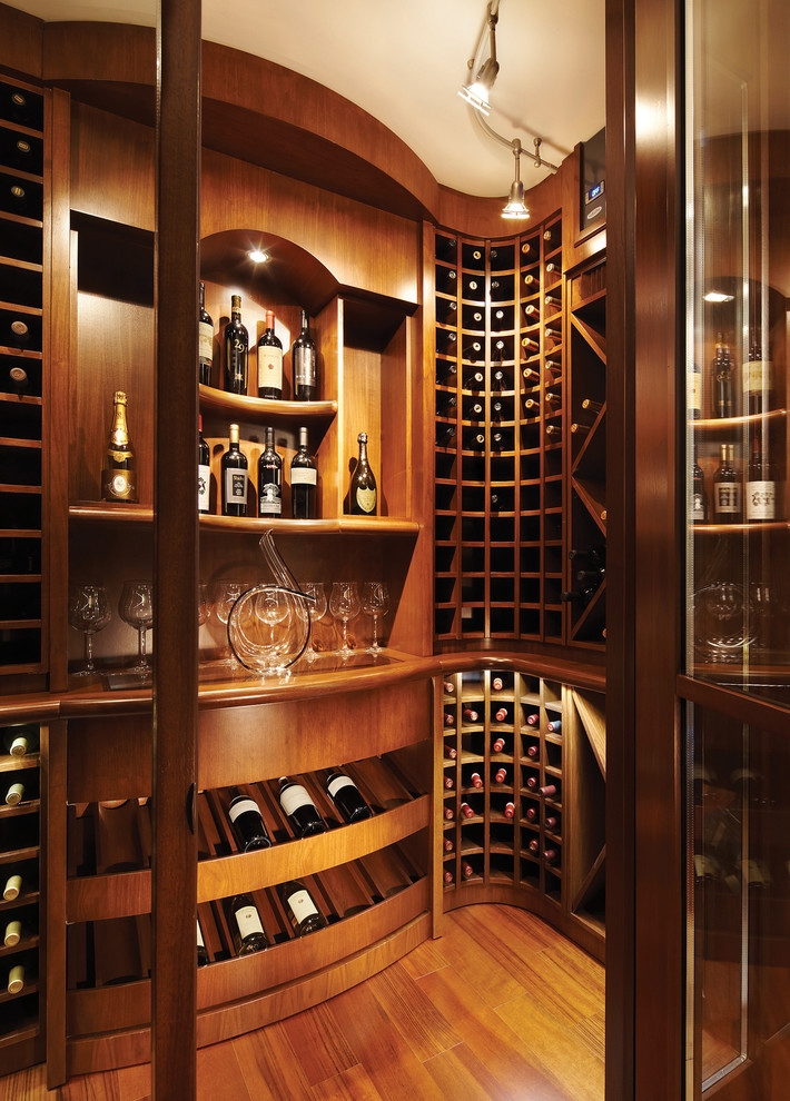 Wine cellar - contemporary wine cellar idea in Miami with storage racks
