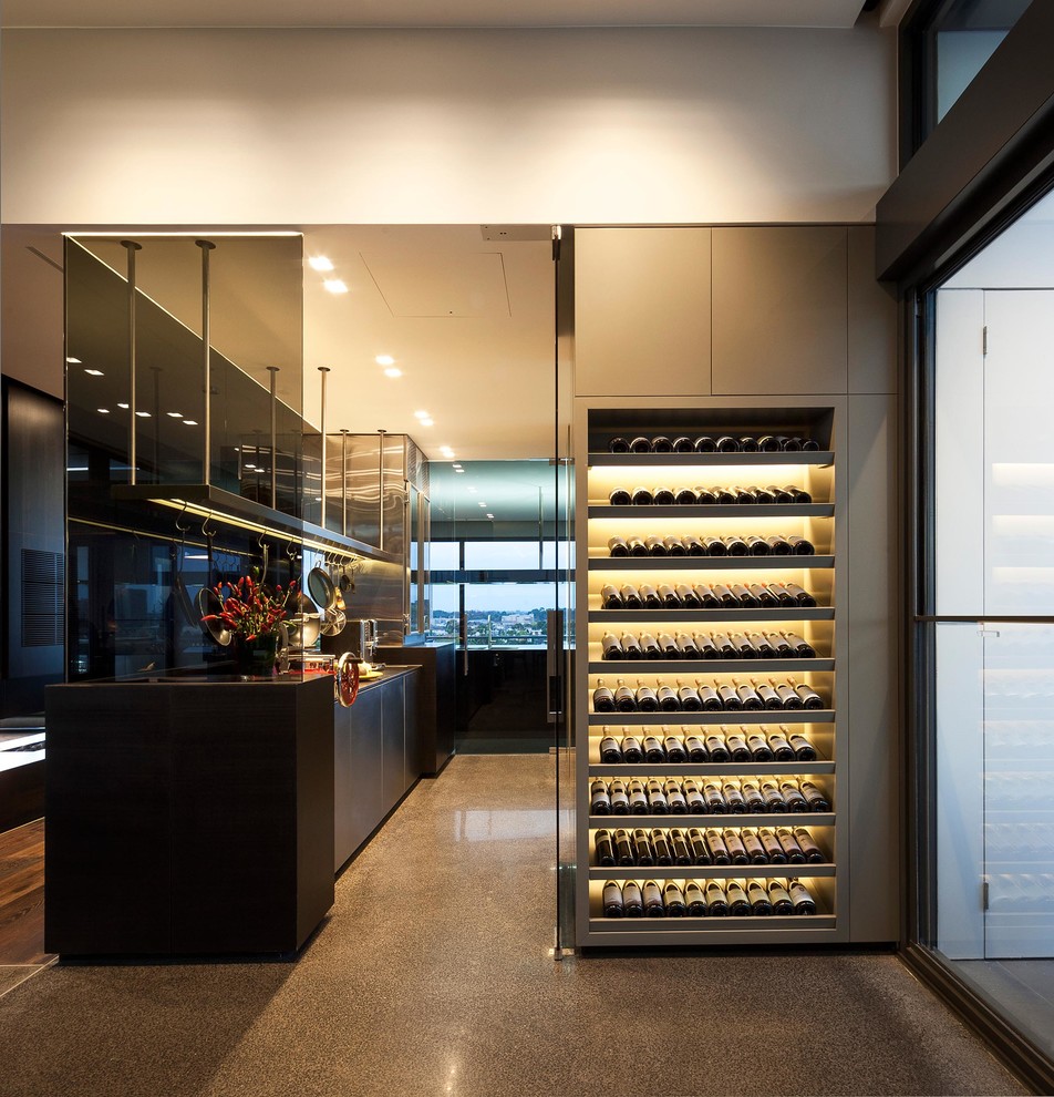 This is an example of a small contemporary wine cellar in Melbourne.