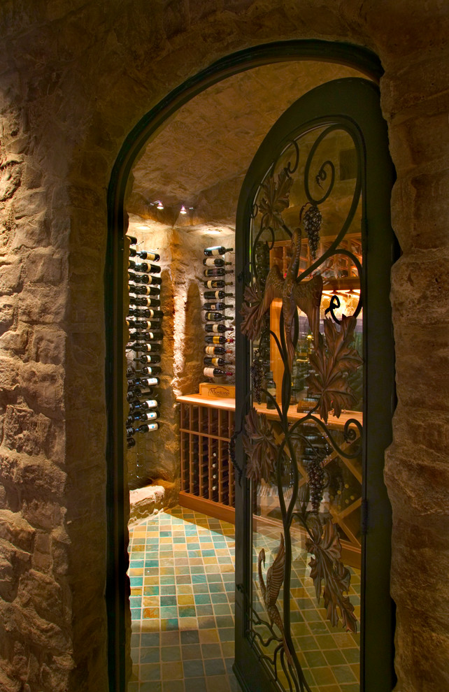 Inspiration for a mediterranean wine cellar in Austin.