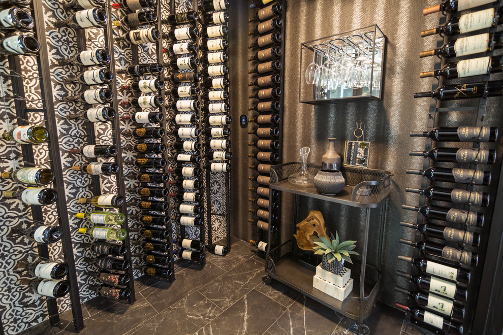 Medium sized modern wine cellar in Los Angeles with porcelain flooring, storage racks and black floors.