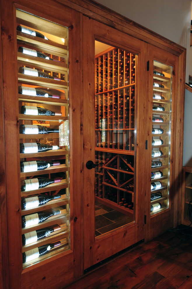 Photo of a rustic wine cellar in Toronto.