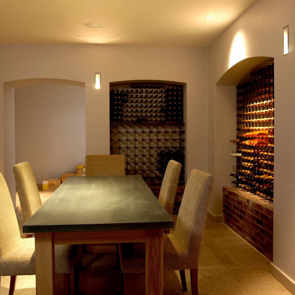 Design ideas for a medium sized contemporary wine cellar in West Midlands with storage racks.