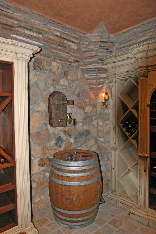 Example of a tuscan wine cellar design in Santa Barbara