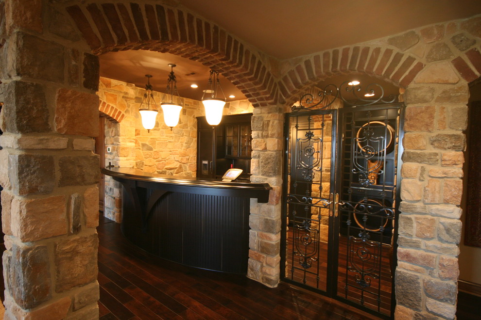 custom bar with stone Rustic Wine Cellar Louisville by Walters