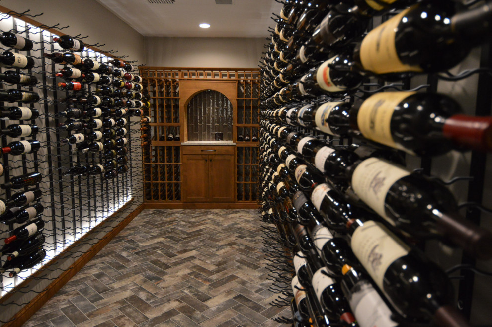Medium sized contemporary wine cellar in Richmond with display racks.