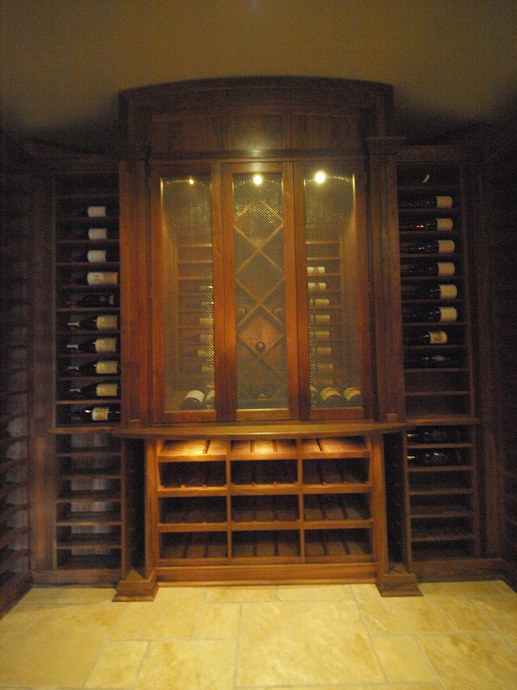 Wine cellar - large traditional wine cellar idea in Calgary with storage racks