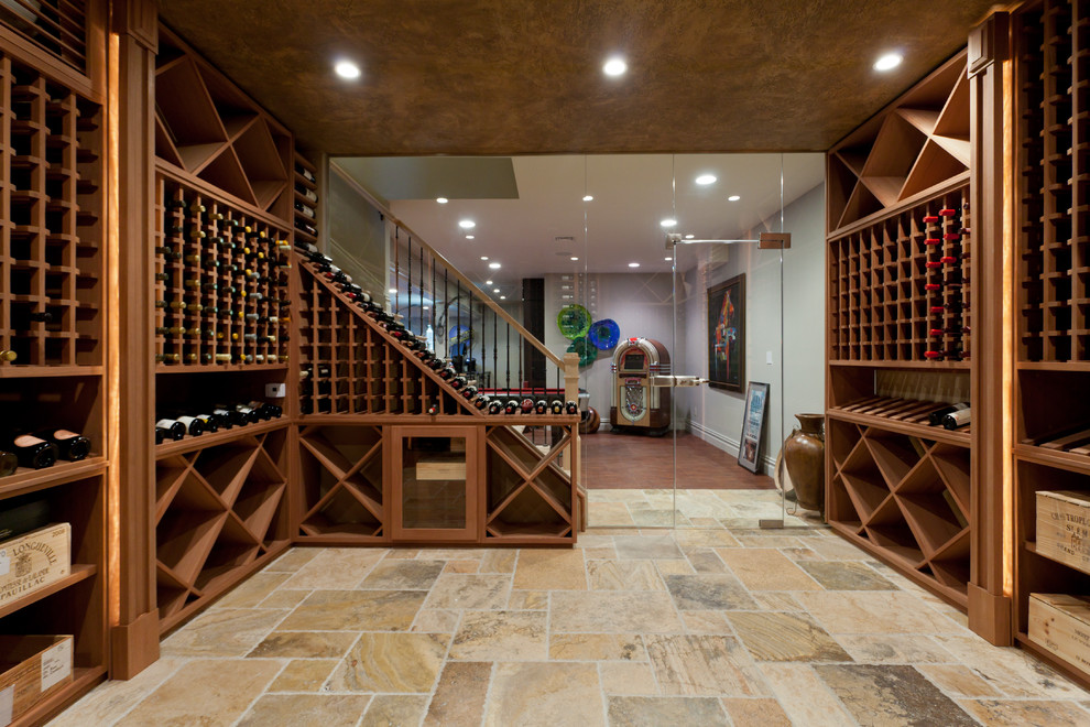 Example of a mid-sized trendy travertine floor wine cellar design in New York with storage racks