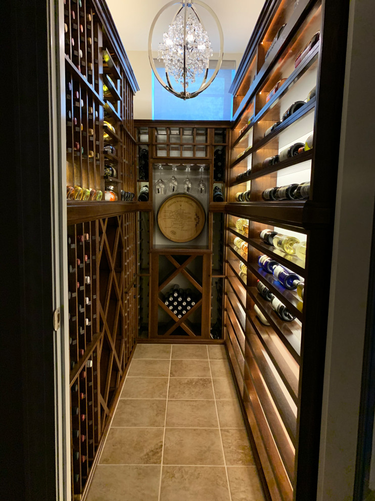 Wine cellar - small modern wine cellar idea in New York with display racks