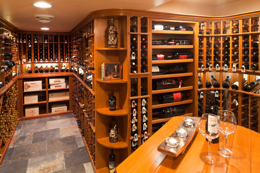 Inspiration for a timeless wine cellar remodel in Baltimore with storage racks