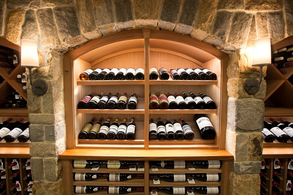 Inspiration for a large mediterranean wine cellar remodel in San Francisco with display racks