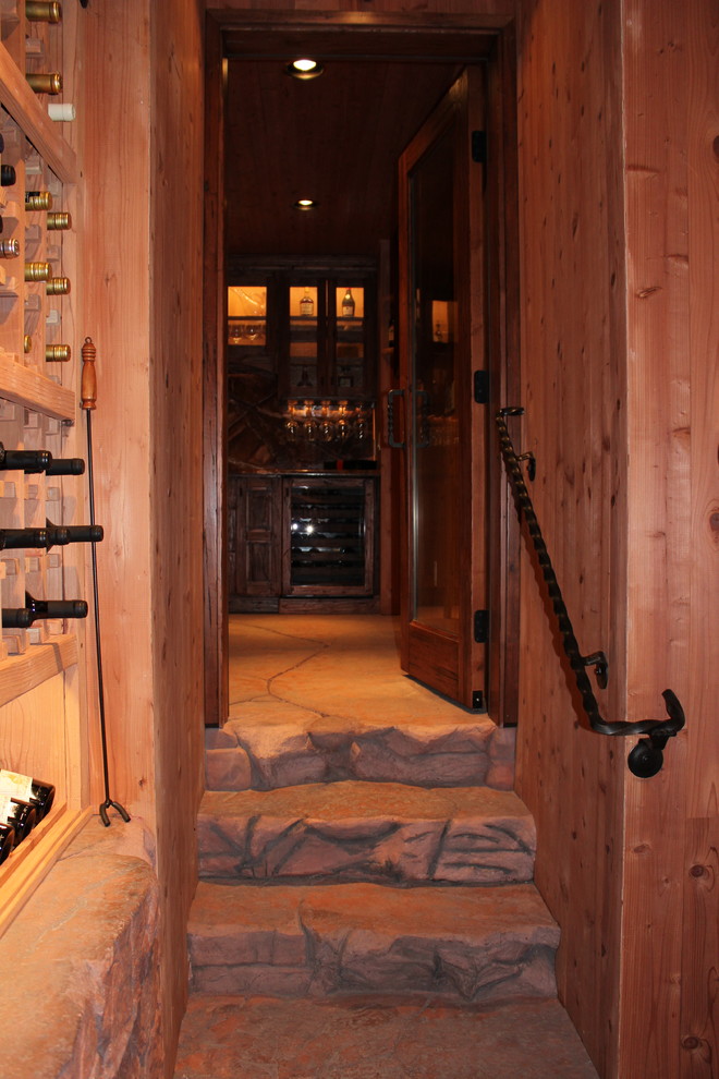 Example of a mountain style wine cellar design in Phoenix