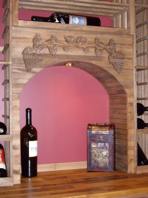 Photo of a medium sized traditional wine cellar in New Orleans with storage racks.