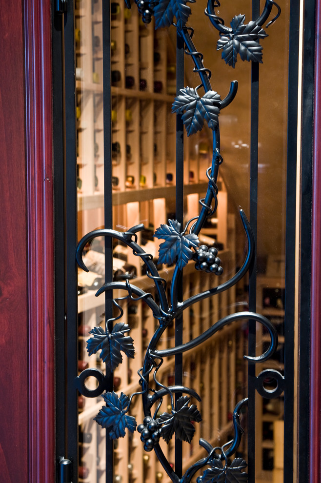 Decorative Wrought Iron on Wine Cellar Door Traditional Wine Cellar