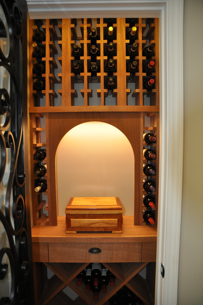 Small eclectic wine cellar photo in Other with display racks