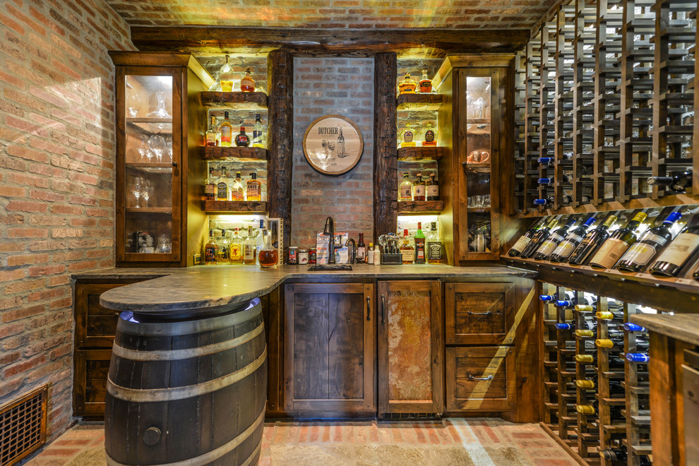 Photo of a medium sized rustic wine cellar in Minneapolis with brick flooring and storage racks.