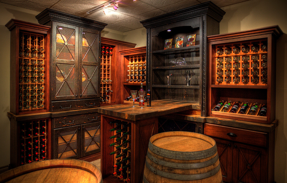 Wine cellar - traditional wine cellar idea in Toronto with storage racks