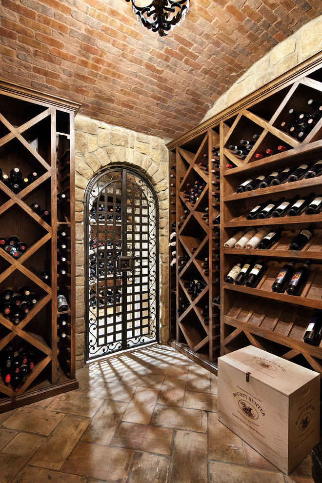 Elegant wine cellar photo in Houston with diamond bins