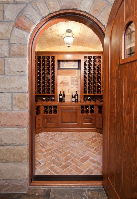 Example of a cottage wine cellar design in Other