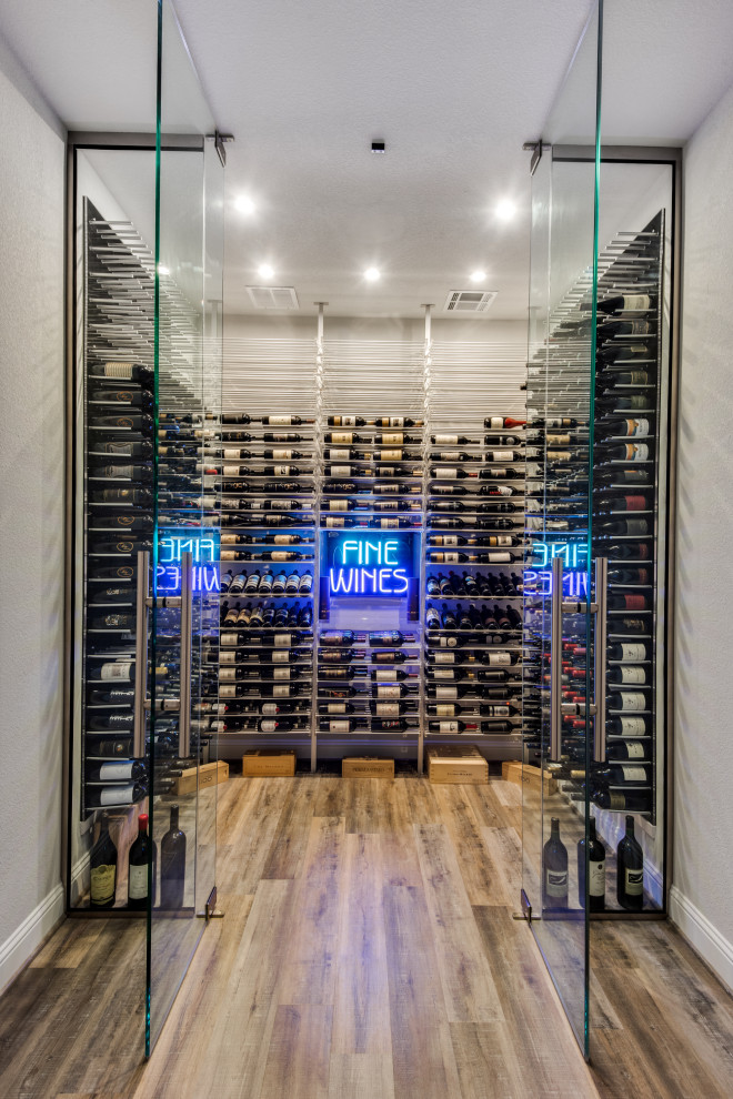 Photo of a modern wine cellar in Dallas.