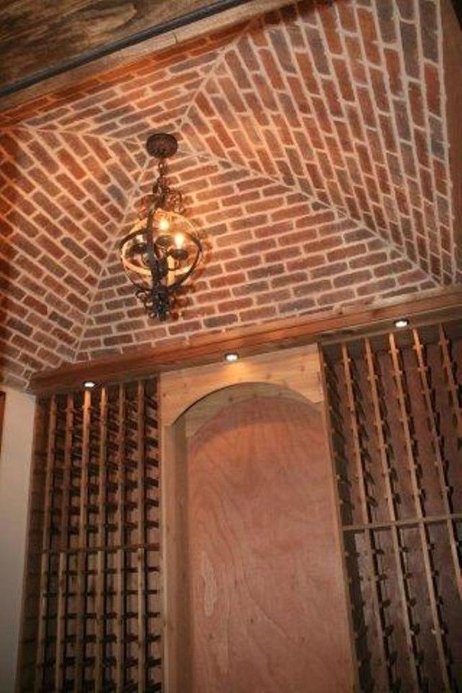 FINISHED BASEMENTS Traditional Wine Cellar Atlanta by Adams