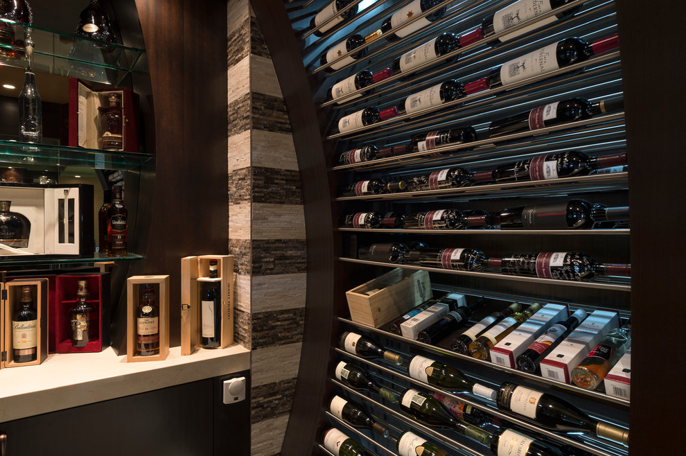 Inspiration for a mid-sized contemporary wine cellar remodel in Vancouver with storage racks