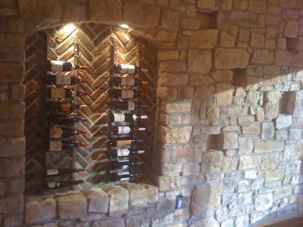 Photo of a medium sized rustic wine cellar in Philadelphia.
