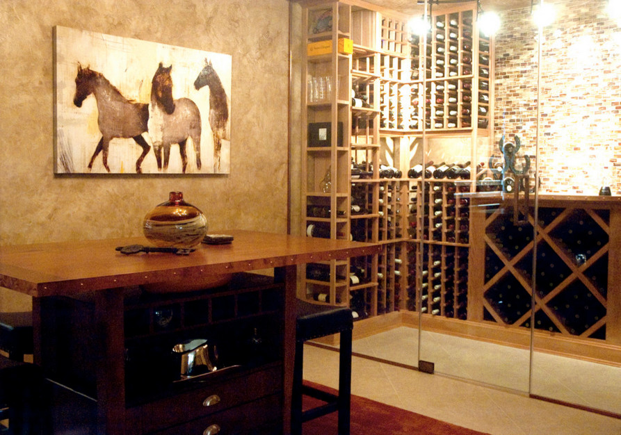 Inspiration for a contemporary wine cellar remodel in Portland with storage racks