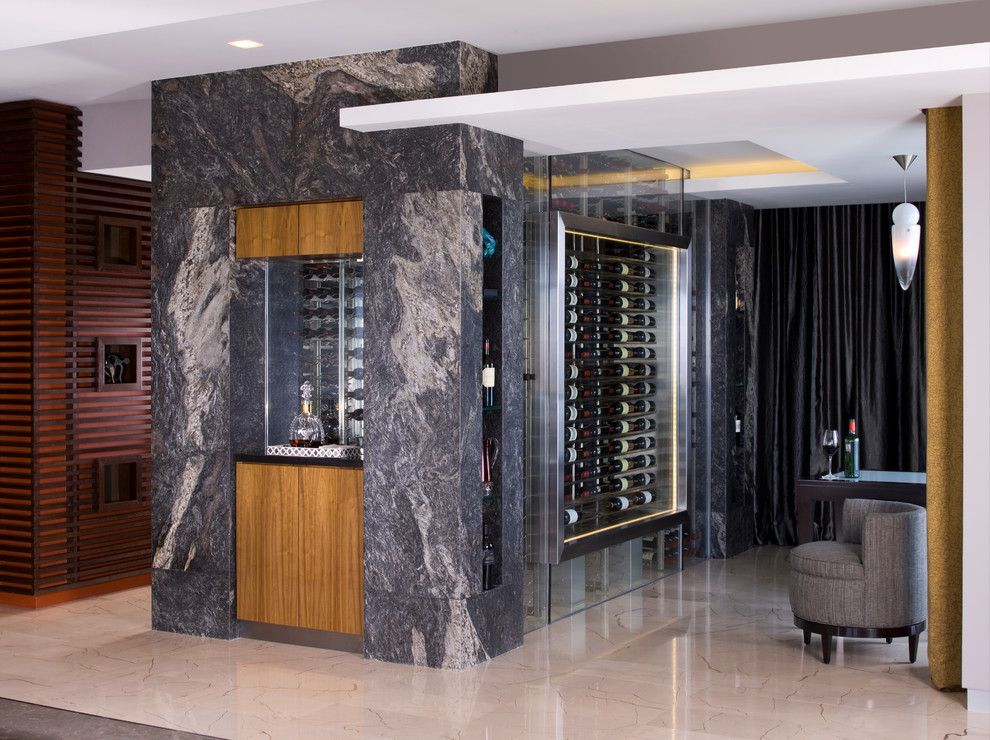 Design ideas for a large contemporary wine cellar in Miami with display racks and limestone flooring.