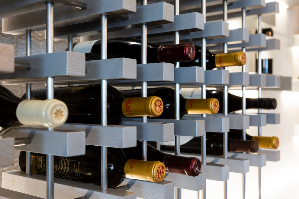 Design ideas for a beach style wine cellar in Boston.