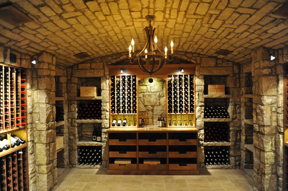 Photo of a medium sized rustic wine cellar in Orange County with ceramic flooring, storage racks and yellow floors.