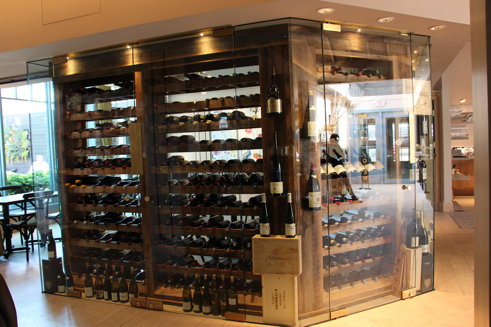 Photo of an expansive traditional wine cellar in Minneapolis with display racks.