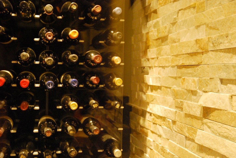 Photo of a large contemporary wine cellar in Los Angeles with storage racks.